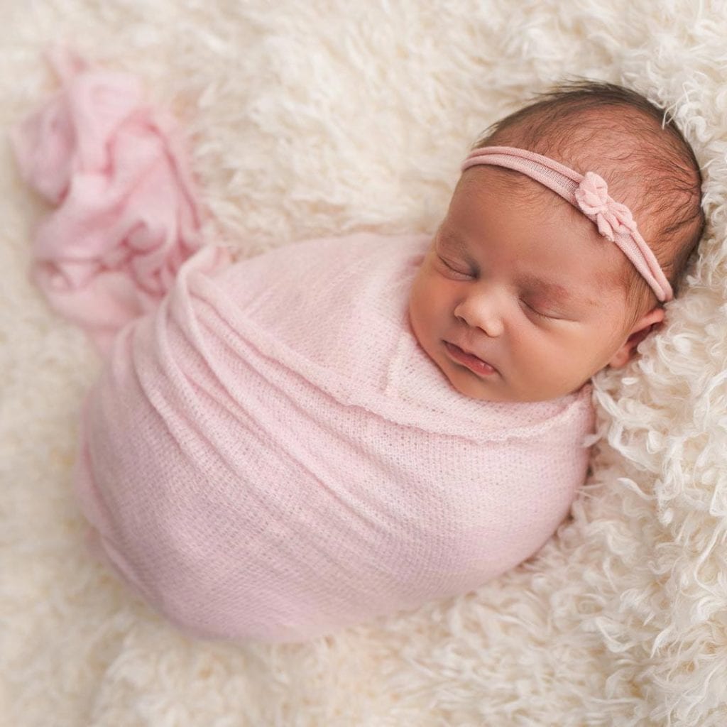 sleeping baby cover with pink cloth and headband